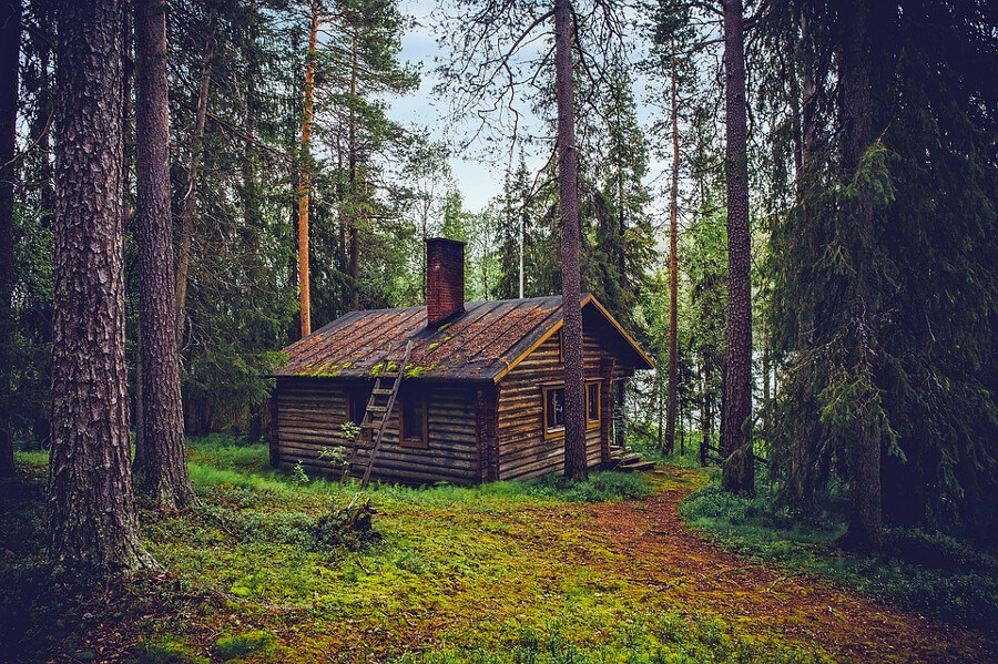 Casa de madera protegida con lasur